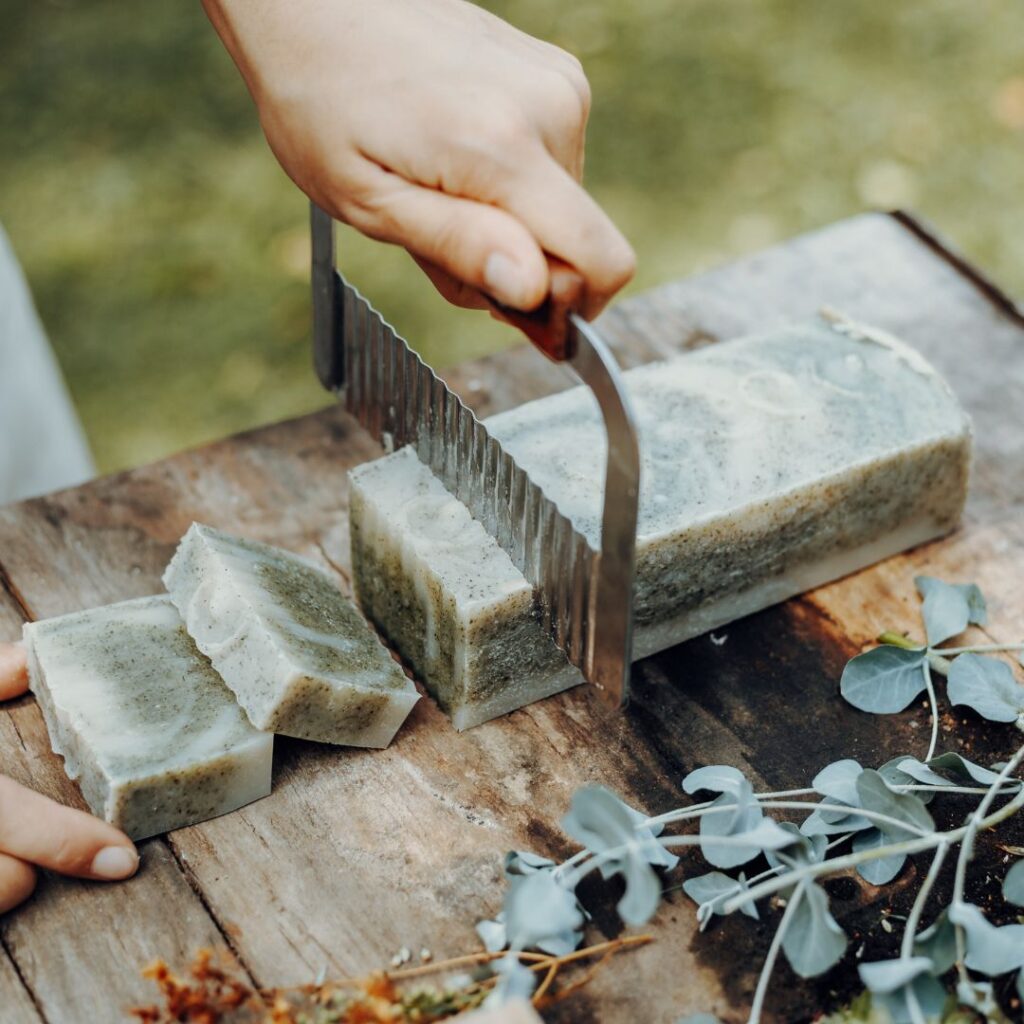 A homesteader making handcrafted goods and services such as homemade soaps and cosmetics, carpentry and woodworking, sewing and clothing repair and teaching workshops and classes